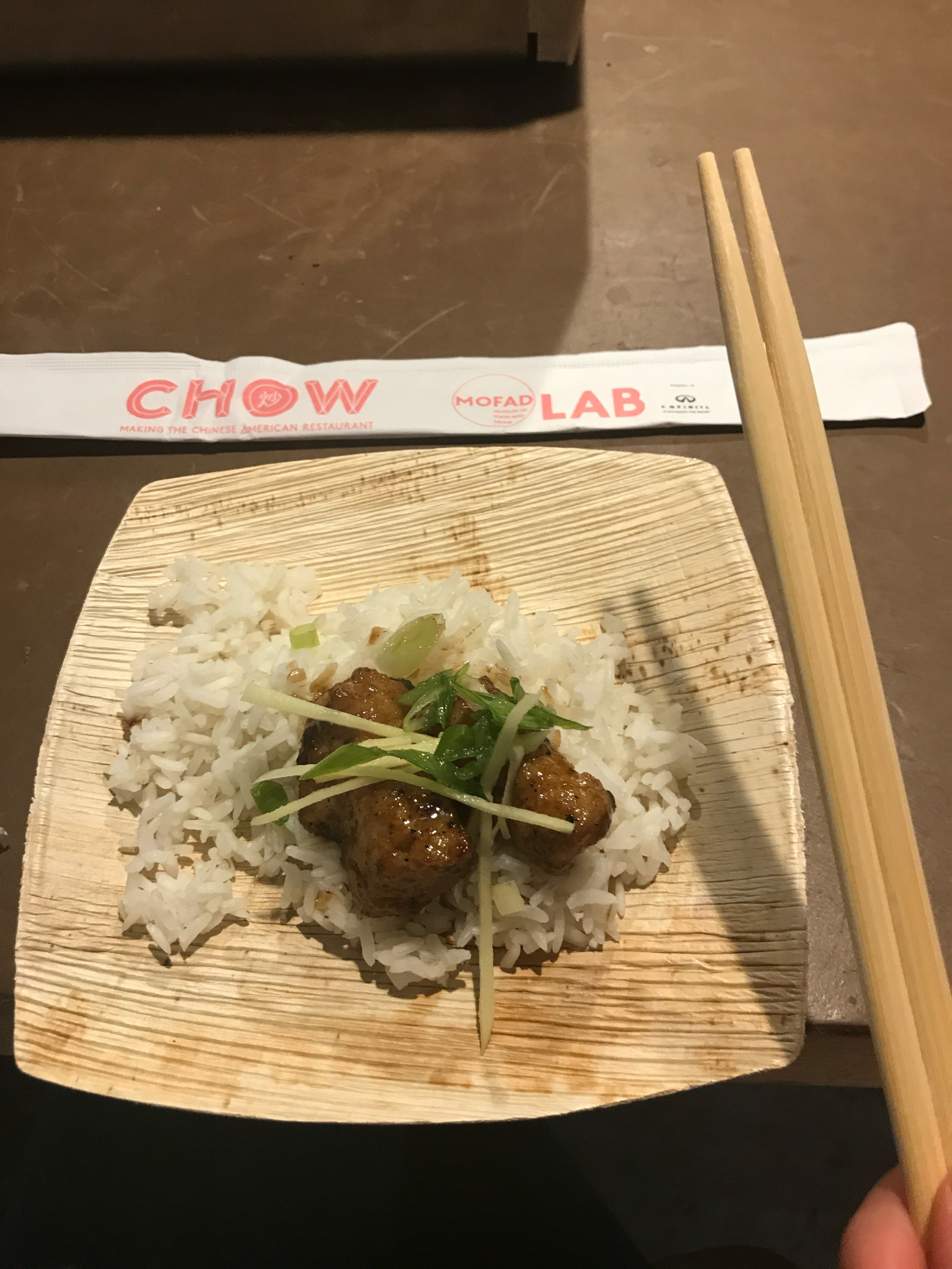 A picture taken by Alice Kennedy of a plate of food taken at the food experience in Chow exhibit, MOFAD.