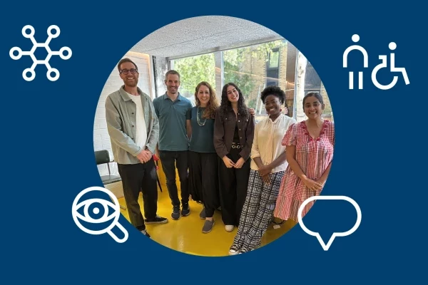 A group of six people standing together and smiling in a bright indoor space with large windows behind them. The photo sits within a circular frame on a blue background featuring simple white icons related to connection, accessibility, vision, and communication.